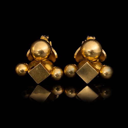 A pair of Indian Pambadam gold earrings.